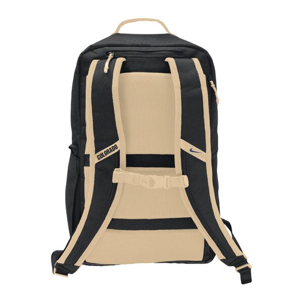 This is the back of the backpack. The padded areas have gold mesh overlays and trim. Other than the trim and backing, the straps are black. The buckle and size adjustor is gold as well.